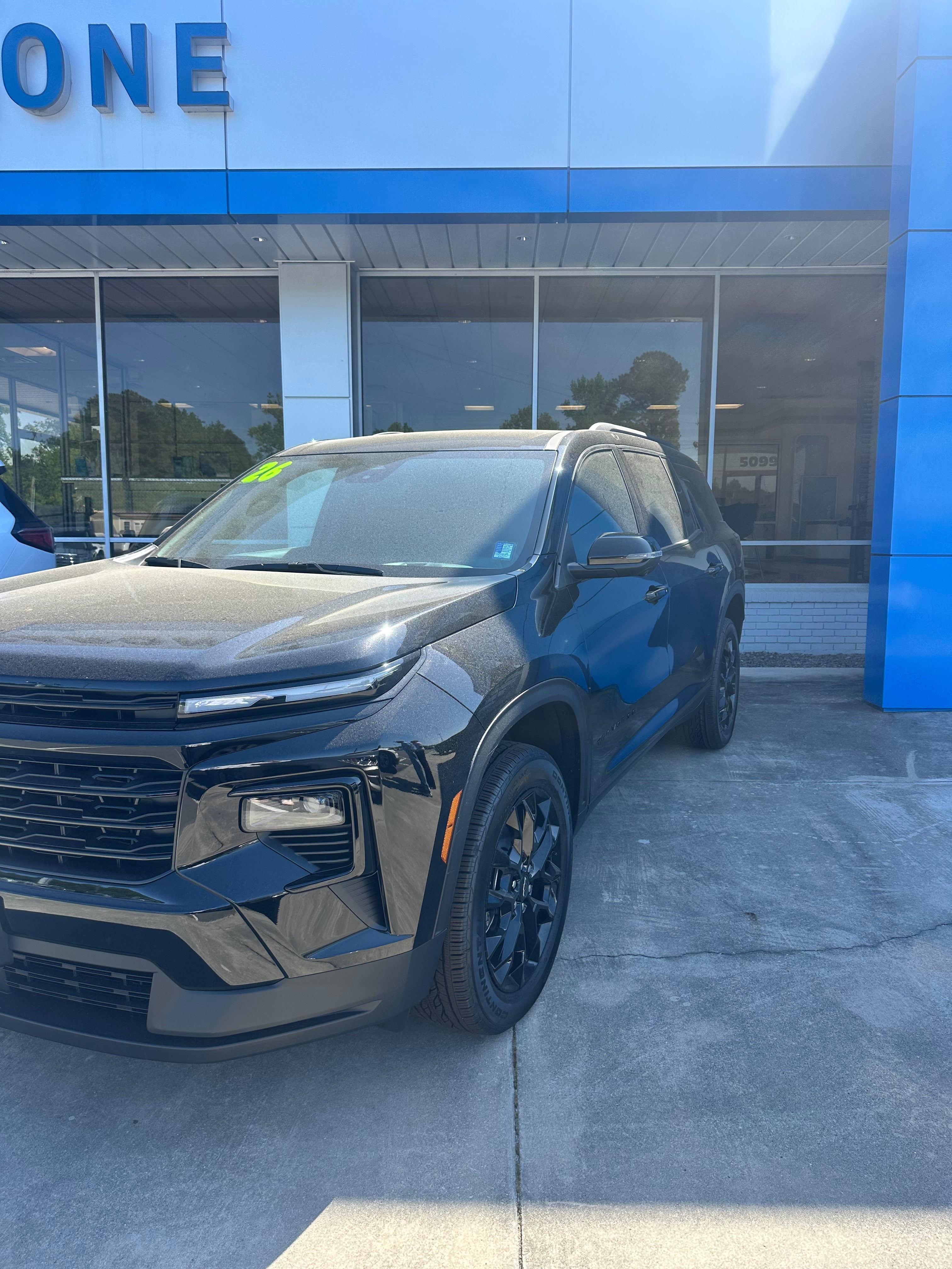 2026 Chevrolet Traverse LT in Mosaic Black Metallic — front three-quarter view