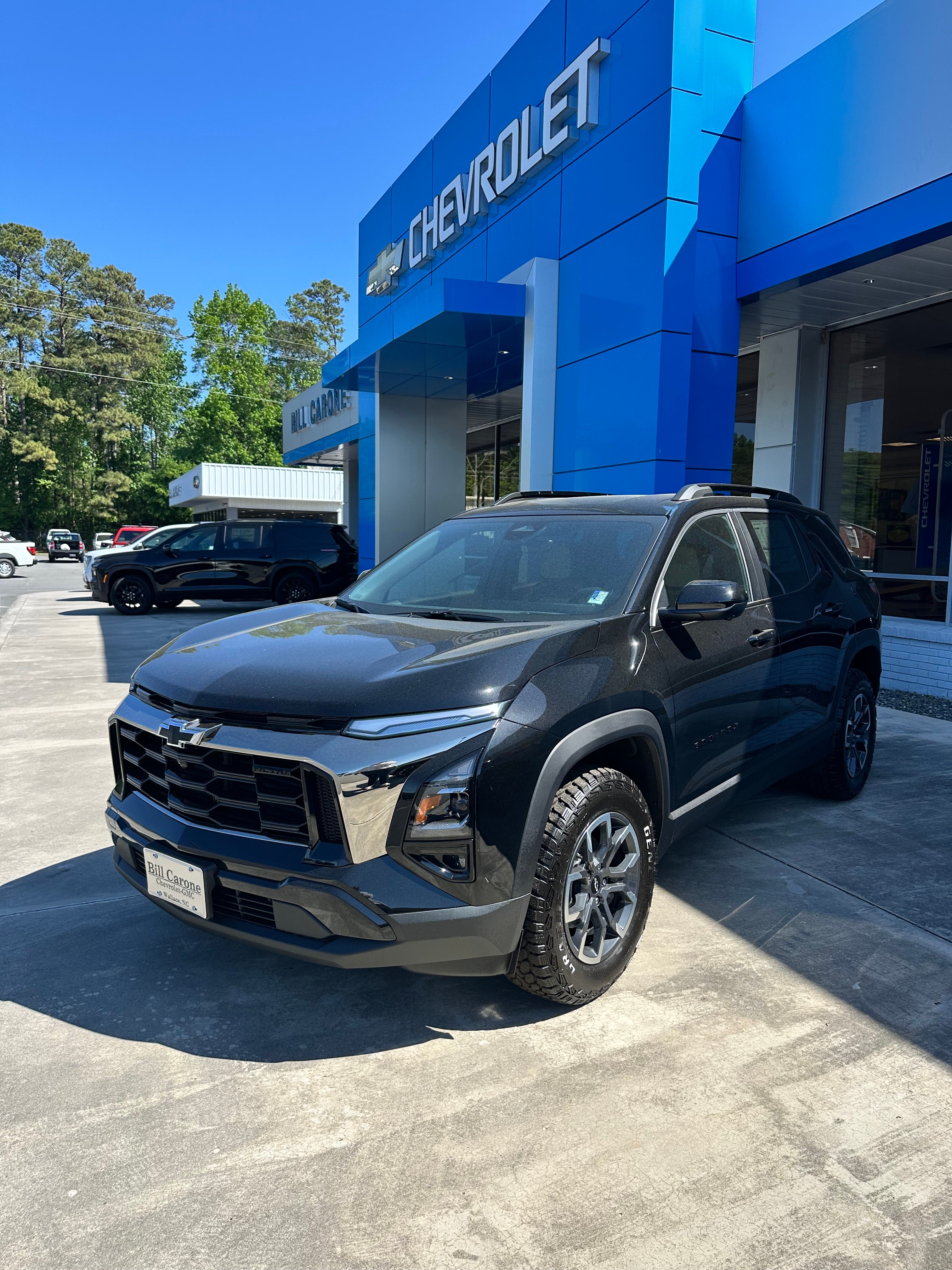 2026 Chevrolet Equinox ACTIV in Mosaic Black Metallic — front three-quarter view